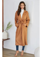 Suede camel colored long duster jacket with an adjustable belted waistline.